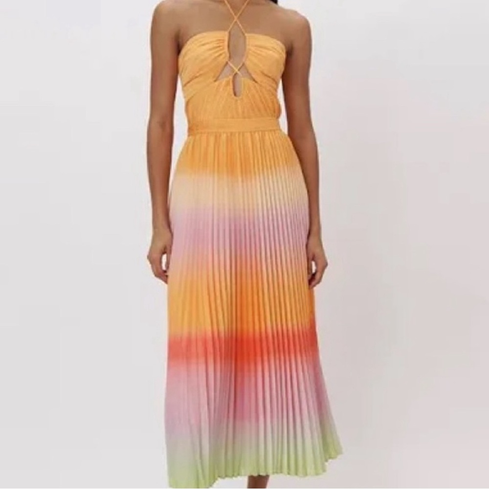 It’s the Annita Ombre Plisse Cut Out Midi Dress from Simkhai